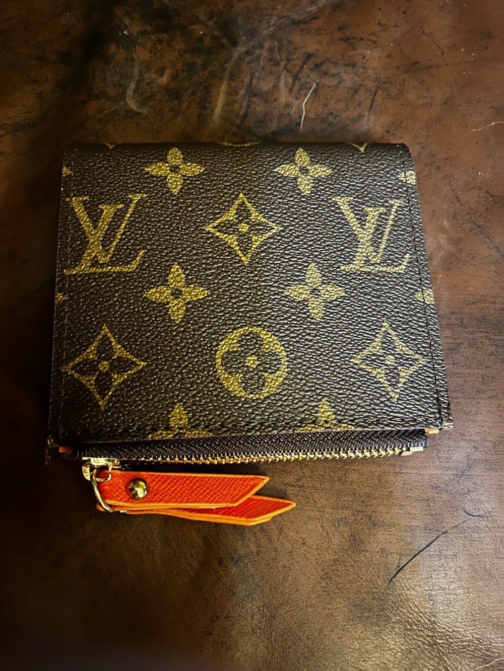 Louis. Vuitton. Brown Signature Momogram Orange Inside Compact Wallet